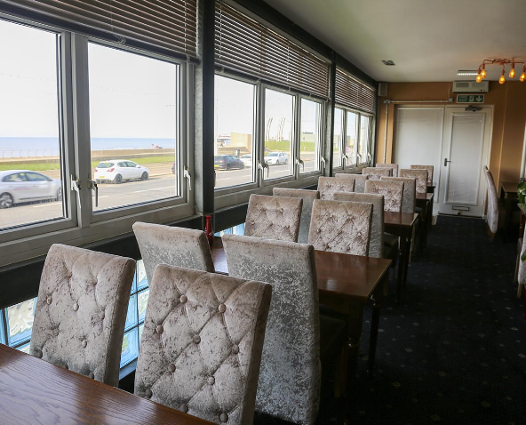 Lunge overlooking the promenade and seafront