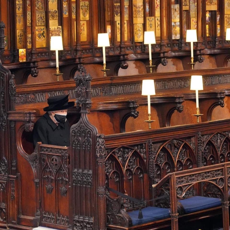 The Queen, sat alone at the funeral