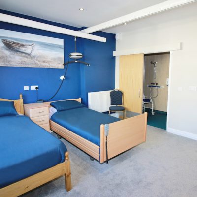 Bedroom with hoist and en-suite wet rom