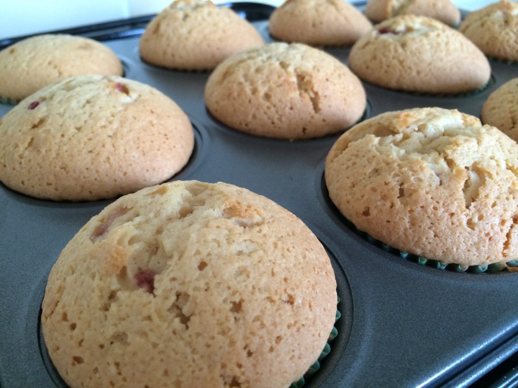 Just-baked cupcakes or fairy cakes
