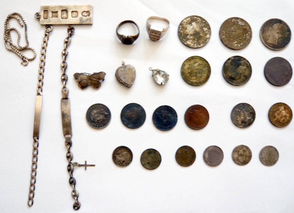 Silver and coins found while metal detecting on Blackpool beach